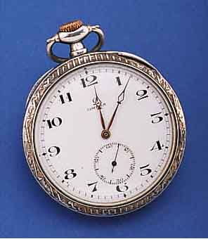 HERRENTASCHENUHR, SCHWEIZ UM 1924, TULASIL- BER, BER., MONOGR. ES, EMAILBL. SIGN., VERG. ANKERW., 15 ST., KOMP.-UNR., GEBL. BREG.-SPIR.D. CA. 51 ...