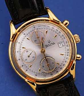 BULOVA ARMBANDCHRONOGRAPH AUTOMATIK SCHWEIZ UM 1996, METALL HARTVERG., EDELST.-BODEN GE- DR., LEDERB., GARANTIEK.UNAUSGEF., SCHUTZ- HüLLE, 25 ...