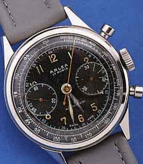 ARLEA ARMBANDCHRONOGRAPH, SCHWEIZ UM 1952, EDELST., BODEN GESCHR., 30-MIN.-STOPPZäHLER, ZIFFERBL. ALTERSBED. FL., TACHYMETERAUßENSKA- LA, 17 ...
