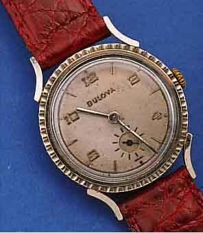 BULOVA ARMBANDUHR, USA UM 1950, WG-FILLED, BODEN GEDR., ORIG.-BLATT FL., RUNDANKERW., 21 ST., HANDAUFZUGKAL. 10AK, SCHR.-UNR., BREG.-SPIR., ...