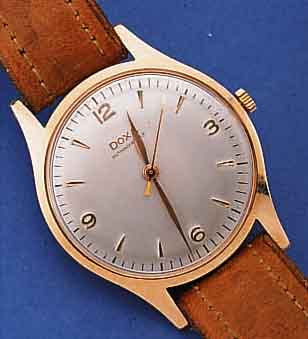 DOXA HERRENARMBANDUHR, SCHWEIZ UM 1945, RG 585/000, BODEN GEDR., BLATT REST., RUNDANKER- W., 17 ST., HANDAUFZUGKAL. 380, SCHR.-UNR., FLACHSPIR., ...