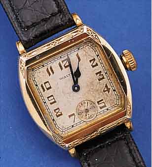 WALTHAM HERRENARMBANDUHR, USA UM 1926, GG-FILLED, BODEN U. GLASR. GEDR., LüNETTE U. SEITL. SCHMUCKGEPR., ORIG.-ZIFFERBL. U. -ZEI- GER ...