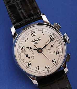 HEUER ARMBANDCHRONOGRAPH, SCHWEIZ UM 1940, EDELST., BODEN U. GLASR. GEDR., BLATT REST., 30-MIN.-STOPPZäHLER, 17 ST., HANDAUFZUG, SCHR.-UNR., ...