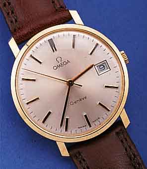 OMEGA HERRENARMBANDUHR GENEVE, SCHWEIZ UM 1975, GG 585/000, BODEN U. GLASR. GEDR., MATT VERS. BLATT, ZENTRALSEK., DATUM, VERG. ANKERW., ...