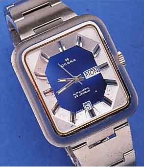 KONVOLUT: 2 OEBRA HERRENARMBANDUHREN, SCHWEIZ FüR DEN DTSCH. MARKT, UNGETR. LAGERW.,UM 1973, BEIDE MASSIV EDELST., BEIDE ETA KAL. 7789, 25 ...