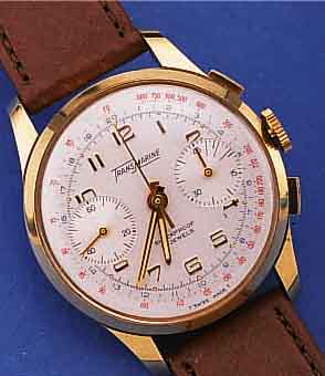 TRANSMARINE ARMBANDCHRONOGRAPH, SCHWEIZ UM 1962, METALL HARTVERG., EDELST.-BODEN U. GLASR. GEDR., VERS. BLATT, 45-MIN.-STOPPZäHLERTELE- U. ...