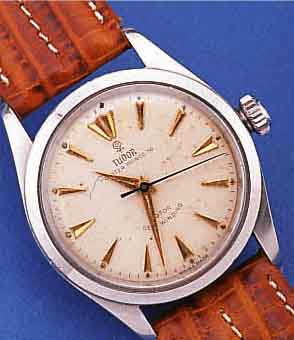 TUDOR HERRENARMBANDUHR OYSTER PRINCE 34, SCHWEIZ UM 1956, EDELST., BODEN U. KRONE GE- SCHR., SYSTEM ROLEX, BEI FERTIGST. WASSERD., ORIG.-BLATT ...