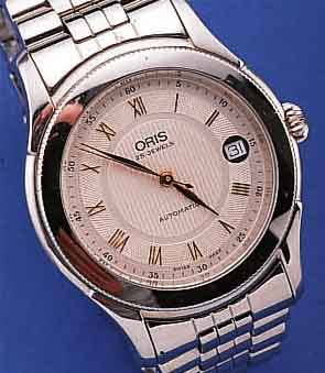 ORIS HERRENARMBANDUHR AUTOMATIK, SCHWEIZ UM 1996, EDELST. INCL. EDELST.-BAND, BOMB. MINE- RALGL., WERK VERG., 25 ST., BASISKAL. ETA 2824/2, ...