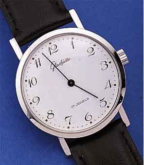 GLASHÜTTE HERRENARMBANDUHR, DEUTSCHLAND UM 1984, METALL HARTVERCHR., EDELST.-BODEN GEDR.,EMAILFARB. KONTRASTZIFFERBL., LEDERB., DAMEN- ...