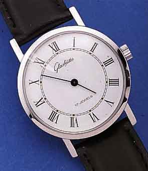 GLASHÜTTE HERRENARMBANDUHR, DEUTSCHLAND UM 1984, METALL HARTVERCHR., EDELST.-BODEN GEDR.,EMAILFARB. KONTRASTZIFFERBL., LEDERB., DAMEN- ...