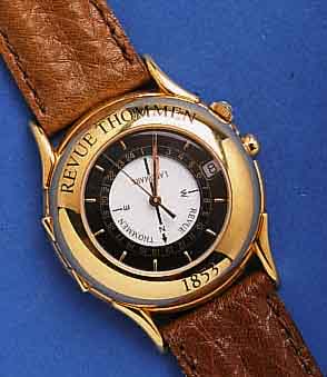REVUE TREVUE THOMMEN HERRENARMBANDUHR MODELL LAND- MARK, METALL HARTVERG., EDELST.-BODEN GEDR., AUFKLAPPB. SCHUTZKAPPE M. MINERALGL., ZWEIT- ...