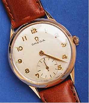 OMEGAOMEGA HERRENARMBANDUHR, SCHWEIZ UM 1955, NEUTR. RG 750/000-GEH., BODEN U. GLASR. GEDR., BLATT PROV. REP., 17 ST., VERG. ANKERW., ...