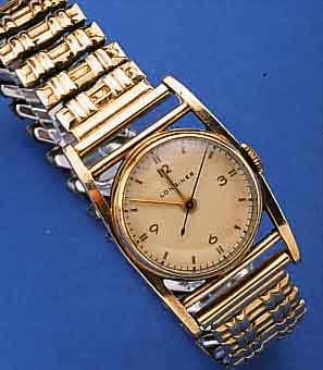 LONGINES HERRENARMBANDUHR, SCHWEIZ/USA UM 1942, GG-FILLED, BET. BANDANST., BLATT REST., BODEN U. GLASR. GEDR., RUNDANKERW., KAL. 10L, M. INDIR. ...