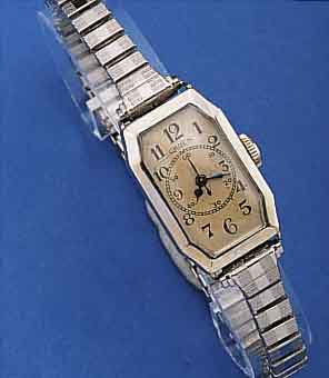 GRÜN DAMENARMBANDUHR, SCHWEIZ/USA UM 1932, WG-FILLED, METALLZUGGLIEDERB. M. WG-AUFL. SPäTER, VERS. ORIG.-BLATT, SELTEN M. ZENTRAL- SEK., ...
