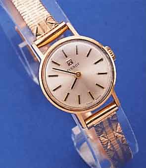 TISSOT DAMENGOLDBANDUHR, SCHWEIZ UM 1960, RG 585/000-GEH., EINSCHALENAUSF., NEUTR. RG 750/000-BAND, RUNDANKERW., HANDAUFZUGKAL. 709, 17 ST., ...