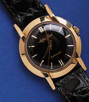 MATTHMATTHEW TISSOT HERRENARMBANDUHR AUTOMATIK, SCHWEIZ/USA UM 1955, GG 585/000, BODEN GESCHR. SCHRAUBRING EDELST., LEDERB. NEU, UHR WURDE ...