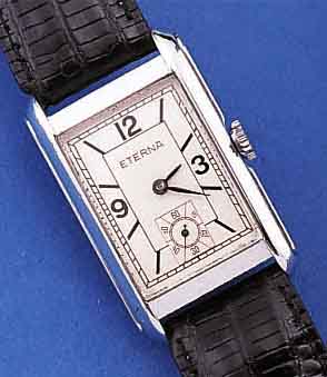 ETERNA HERRENARMBANDUHR, SCHWEIZ UM 1938, EDELST., RECT.-FORM, BODEN GEDR., BLATT INCL. UHR REST., FORMANKERW., 15 ST., GEPR. CHATONS,SCHR.-UNR., ...