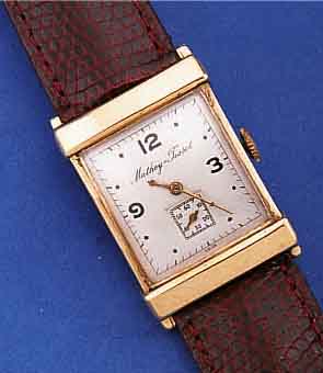 MATTHEW TISSOT HERRENARMBANDUHR, SCHWEIZ/ USA UM 1950, GG 585/000, AUF GEDR. BODEN WIDMUNGSGRAV., BLATT REST., FORMANKERW., VERS., ...