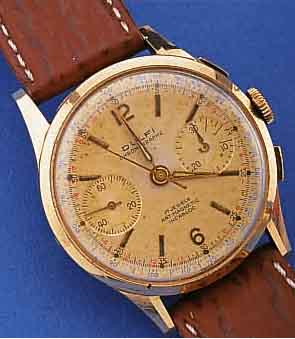 DULFI ARMBANDCHRONOGRAPH, SCHWEIZ UM 1958, ROSE-G. 750/000, BODEN U. GLASR. GEDR., METALLCUV. ZUR ARMIERUNG, ORIG.-BLATT FL., TELE- U. ...
