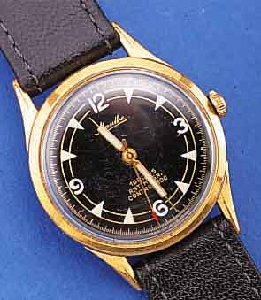 MAUTHE HERRENARMBANDUHR, RESERV. FüR VW, SO SONDERGRAV. AUF GEH.-BODEN FüR HOHE KILOME-TERLEISTUNG, DEUTSCHLAND UM 1958, METALL HART-VERG., ...