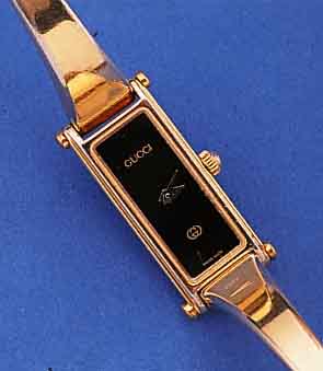 GUCCI DAMENARMBANDUHR, GG-AUFL. INCL. SPANGENBAND, HIGH-TECH-QUARTZW., MINERALFLACH-GL., BODEN GEDR., SCHWEIZ UM 1988, NUTZSP. ALTERSBED., ...