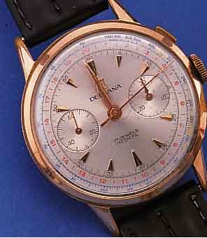 DELBANA ARMBANDCHRONOGRAPH, SCHWEIZ UM 1958,METALL ROTVERG., BER., EDELST.-BODEN U. GLASR.GEDR., 30-MIN.-STOPPZäHLER, AUßENSKALEN FARBL.DIFF., 17 ...