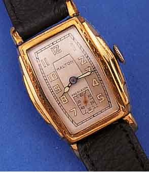 KONVOLUT: 2 HERRENARMBANDUHREN NORDAMERIKA, BEIDE METALLGEH. M. GG-AUFLAGE, EDELST.-BöDEN GEDR., BEIDE TONENFORM, 1 X WALTHAM, 16 ST., ...