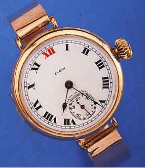 ELGIN ARMBANDUHR, USA UM 1929, METALL, ROSE-G.-AUFL., KEYSTON-WATCHCASE, SCHARNIERBODEN, GLASR. GEDR., PERF., SIGN. EMAILBL. 2-TEIL., ROTE RöM. ...