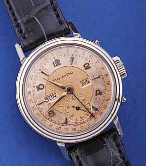 MOVADO HERRENARMBANDUHR VOLLKALENDER AUßER MONDPHASE, EDELST., BODEN GESCHR., SCHWEIZ UM 1949, VERS. BLATT FL., KORREKTURDR. SEITL. IM GEH. ...
