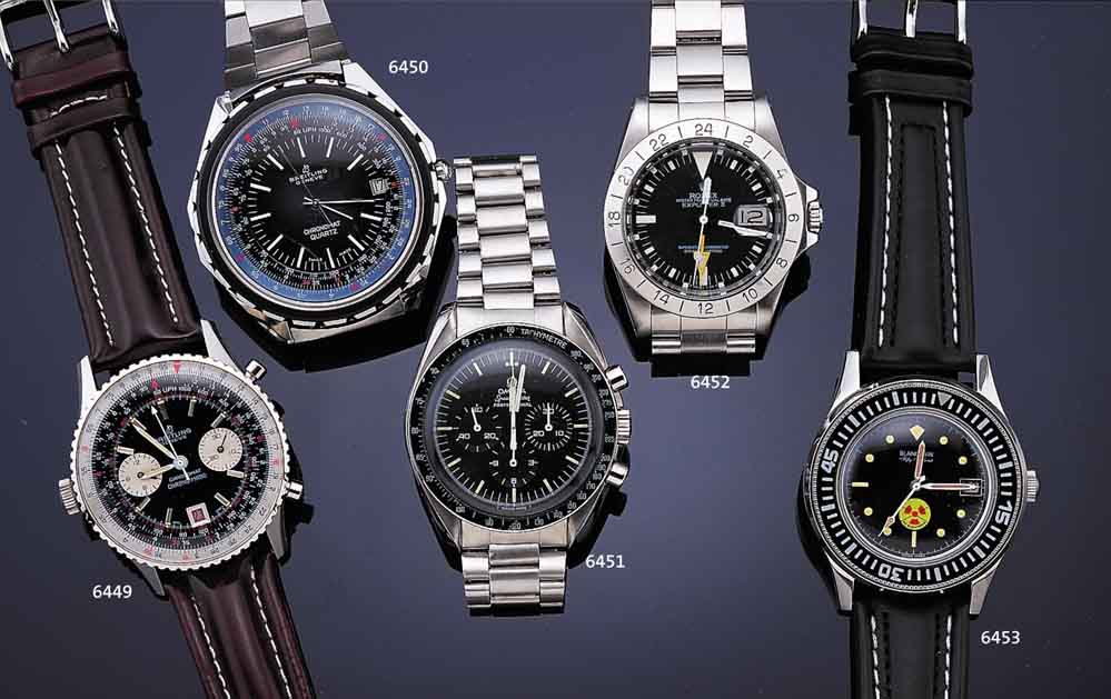 OMEGA ARMBANDCHRONOGRAPH SPEEDMASTER PROFES- SIONAL "THE FIRST WATCH WORN ON THE MOON", SO SONDERGRAV. AUF EDELST.-BODEN GESCHR., ...