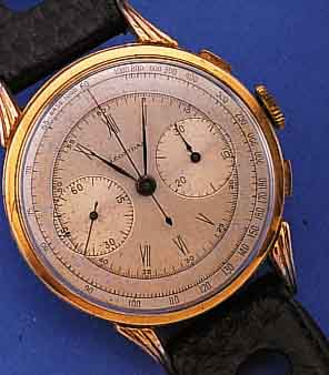 LEONIDAS ARMBANDCHRONOGRAPH, SCHWEIZ UM 1940, METALL ROSEVERG., BER., EDELST.-BODEN U. GLASR. GEDR., ORIG.-BLATT FL., 17 ST., BASISKAL. ...