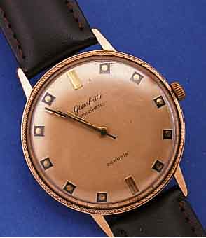 GLASHÜTTE HERRENARMBANDUHR SPEZIMATIC, DEUTSCHLAND UM 1969, METALL ROTVERG., BER., EDELST.-BODEN GEDR., BANDANST. L. VERZ., KAL. 74/683, ...