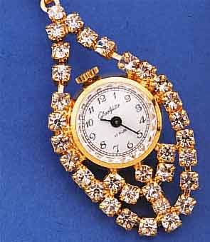 KONVOLUT: 2 GLASHÜTTE ANHäNGEUHREN, METALL M. STRAß BES., VERSCH. DESIGN (1X GELB, 1X WEIß VERG.), UNGETR. LAGERW., EHEM. DDR-PRO- DUKTION ...