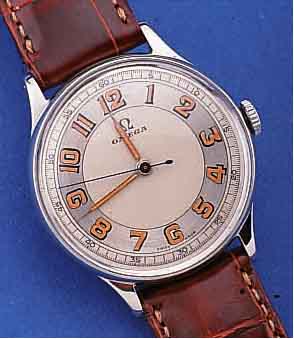 OMEGA HERRENARMBANDUHR, SCHWEIZ UM 1949, EDELST., BODEN U. GLASR. GEDR., NUTZSP. üBER- ARB., BLATT REST., AUFWEND. STD.-ZEICHEN M. ...