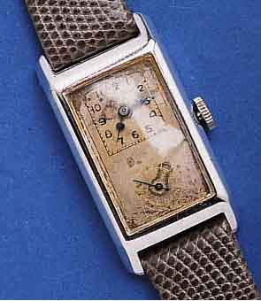 DOXA DODOXA DOCTORS' WATCH, SCHWEIZ UM 1936, NICKEL-CHROM, RECT.-FORM, SCHARNIERBODEN IN SICH L. GEW., ORIG.-BLATT L. FL., TYP. AUS DER MITTE ...