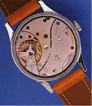 ETERNA HERRENARMBANDUHR, SCHWEIZ 40ER JAHRE,EDELST., BODEN GESCHR., AUßER LEDERB. ORIG.- ZUST., BLATT ALTERSBED. FL., GR. RUNDANKERW., 15 ST., ...