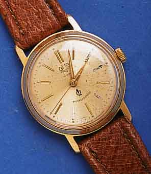 GUB HGUB HERRENARMBANDUHR, DEUTSCHLAND UM 1966, METALL GELB VERG., EDELST.-BODEN GEDR., ZIF- FERBL. WOHL AUS REP.-GRÜNDEN VON KAL. 70,3, FL., ...