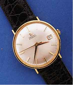 OMEGA HERRENARMBANDUHR AUTOMATIK, SCHWEIZ UM 1960, GG 750/000, BODEN U. GLASR. GEDR., VERS. BLATT M. AUFGES. GOLD-STD.-ZEICHEN, GOLDZEIGER LEDERB. ...