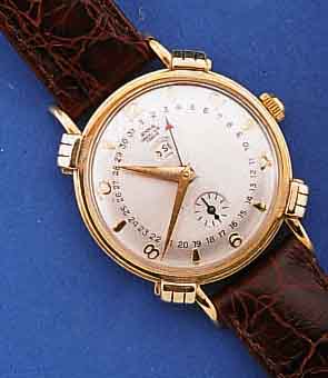 BENRUS HERRENARMBANDUHR, SCHWEIZ/USA UM 1952, GG-FILLED, AUFWEND. GEH. M. GEBUNDENEN BANDANST., BODEN GEDR., BLATT REST., KL. SEK. VERT., TAG U. ...