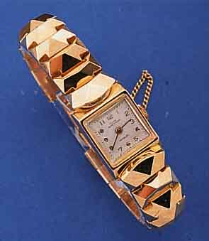 FLUVA DAMENGOLDBANDUHR, SCHWEIZ/FRANKREICH UM 1948, AUFWEND. ROSE-G. 750/000-GEH. INCL. ROSE-GOLD-SCHUPPENGL.-BAND, SICHERHEITSKETT- CHEN, ...