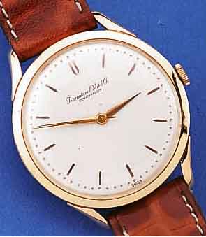 IWC HERRENARMBANDUHR, SCHWEIZ UM 1958, NEU- TR. RG 750/000-GEH., BLATT REST., 16 ST., HANDAUFZUGKAL. 89, GEPR. CHATONS, SCHR.-GLYC.-UNR., ...