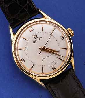 OMEGA HERRENARMBANDUHR, SCHWEIZ UM 1959, EDELST., BODEN GEDR., BEI FERTIGST. WASSER- GESCH., STARKE GG-HAUBE, BLATT REST., BEZ. SEAMASTER, ...