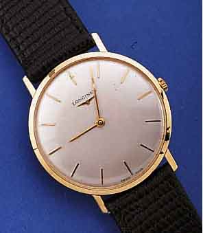LONGINES HERRENARMBANDUHR, SCHWEIZ UM 1968, FLACHES GG 750/000-GEH., GLASR. GEDR., VERS. BLATT, RUNDANKERW., 17 ST., HANDAUFZUGKAL. 428, ...