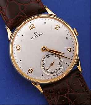 OMEGA HERRENARMBANDUHR, SCHWEIZ UM 1950, ROSE-G. 750/000, BODEN U. GLASR. GEDR., BLATT REST., WERK VERG., 17 ST., HANDAUFZUGKAL. 28, KOMP.-UNR., ...