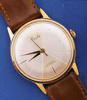 ONSA HERRENARMBANDUHR, SCHWEIZ UM 1964, AUF- WEND. GG 750/000-GEH., BODEN GESCHR., FLACHE GESAMTAUSF., 21 ST., HANDAUFZUG, BASISKAL. ETA 2390, UHR ...