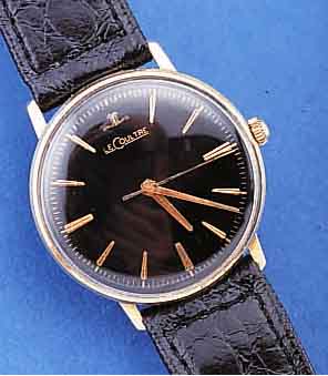 LE COULTRE HERRENARMBANDUHR, SCHWEIZ/USA UM 1965, GG-FILLED, EINSCHALENGEH., GET. A-WELLE,BEI FERTIGST. WASSERGESCH., BLATT REST., RUNDANKERW., ...