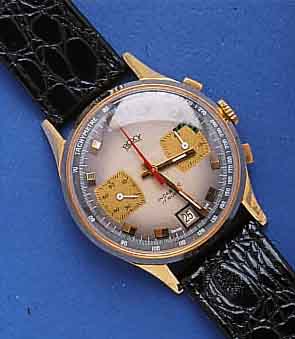 ROXY ARMBANDCHRONOGRAPH, SCHWEIZ UM 1965, GG 750/000, BODEN U. GLASR. GEDR., BLATT FARBL. DIFF., 45-MIN.-STOPPZÄHLER, DATUM BEI 6, ...