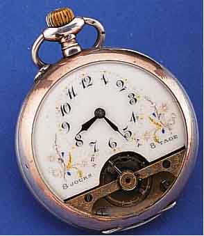 HERRENTASCHENUHR MIT 8-TAGEWERK BAUWEISE HEBDOMAS, SCHWEIZ UM 1920, SILBER, RäNDER VERG., EMAILBL. FEIN HAARR., GOLD U. SILBER- PIQUETARB., ...
