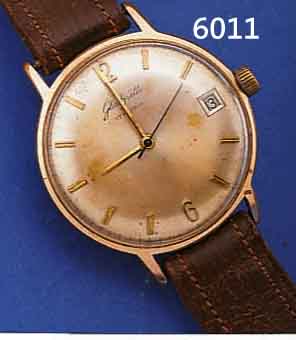 GUB HERRENARMBANDUHR, DEUTSCHLAND UM 1964, METALL VERG., BER., EDELST.-BODEN GEDR., ZENTRALSEK., DATUM, 17 ST., KAL. 69,1, STOß- GES., ...