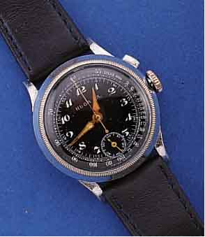 HUGA S.A. FLIEGERCHRONOGRAPH, SCHWEIZ UM 1938, METALL VERCHR., BODEN U. GLASR. GEDR., GLASR. DREHB. (INNENZEIGER WURDE ENTFERNT), SCHW. ...